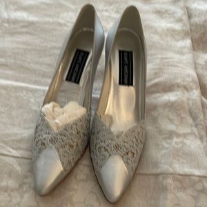 Stuart Weitzman, silver with lace, heels, never worn, 9AA